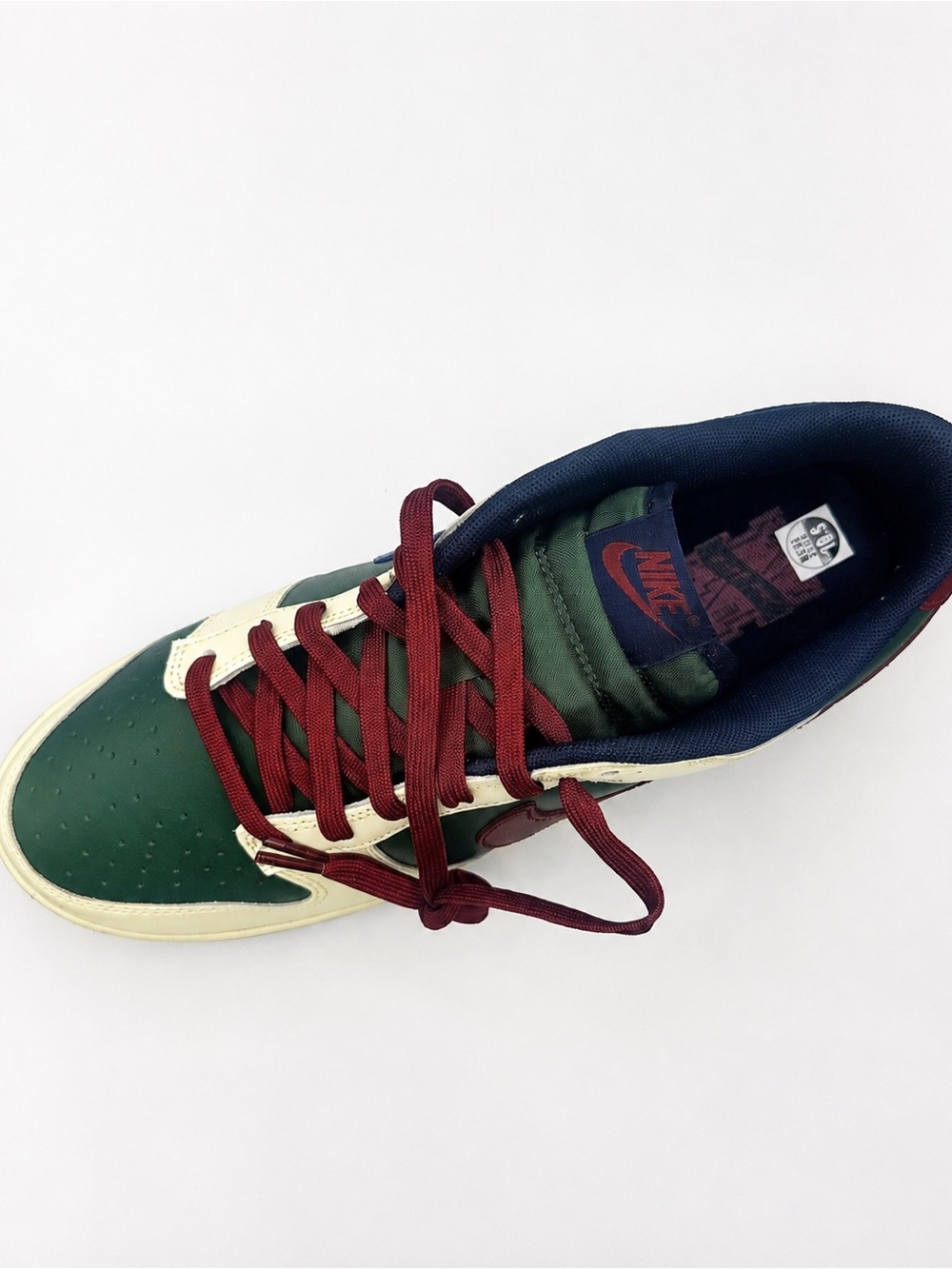 Nike sneakers in green, cream, burgundy, and blue colorway Men’s size 10.5
